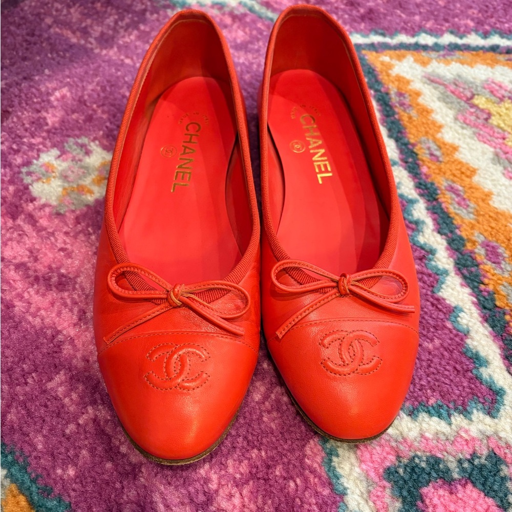 CHANEL Red Leather Flats with Bow Detail